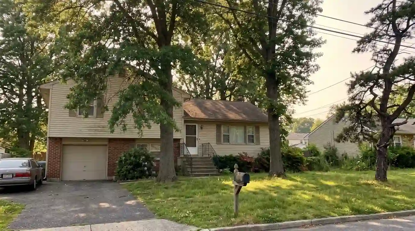 Split-level house with pin oaks in a South Jersey suburb